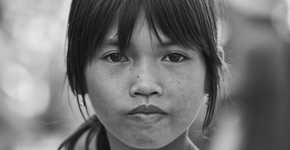 A young girl from the Tonle Sap community — one of the children IHM serves